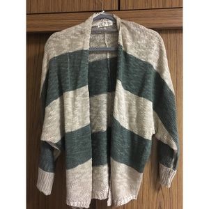 green and beige cardigan